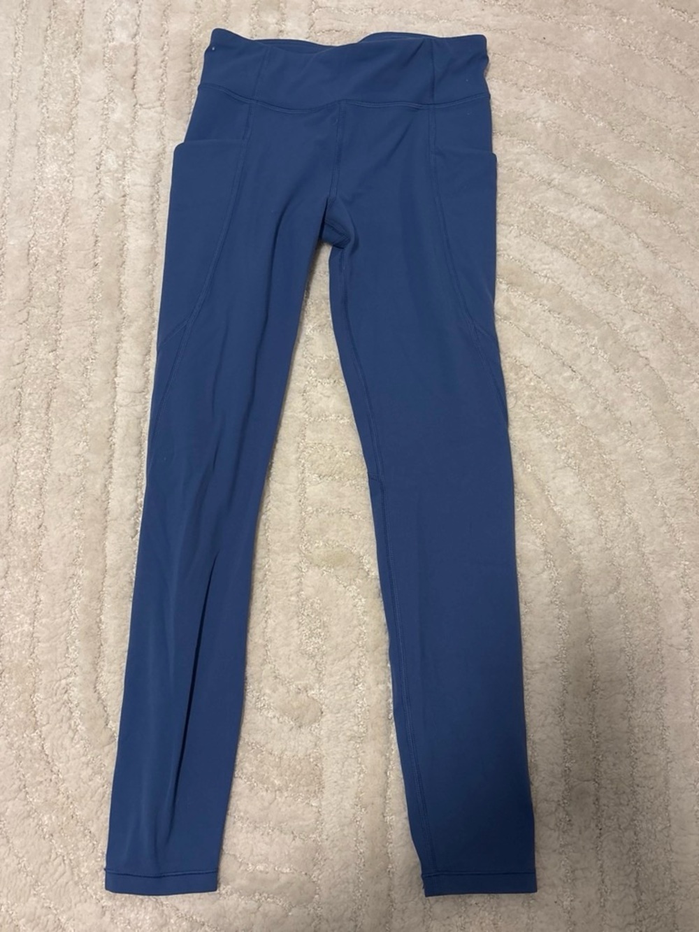 athleta girl blue leggings with side pockets